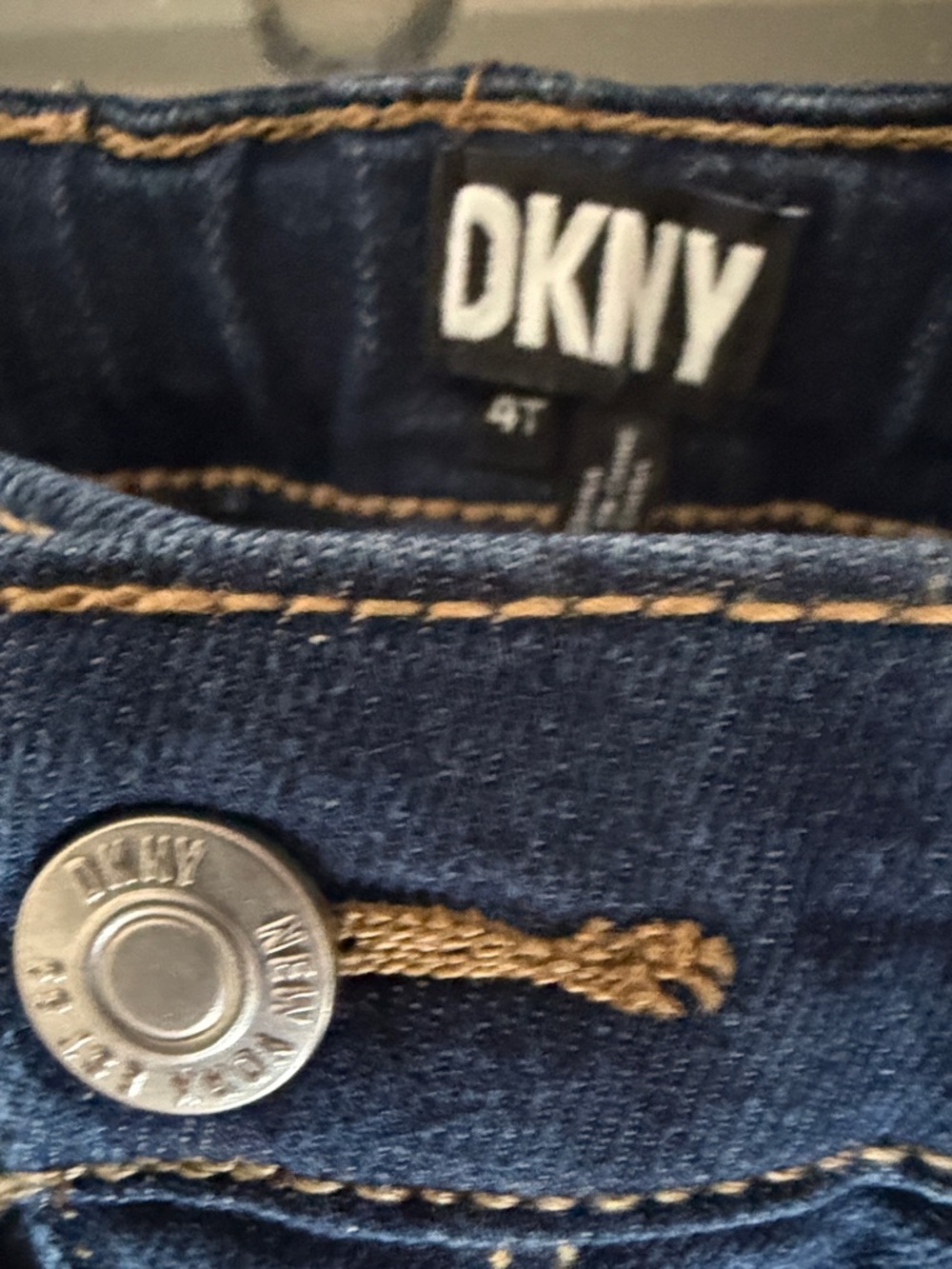 Girl’s DKNY Navy Blue Denim Jeans with Tan Stitching